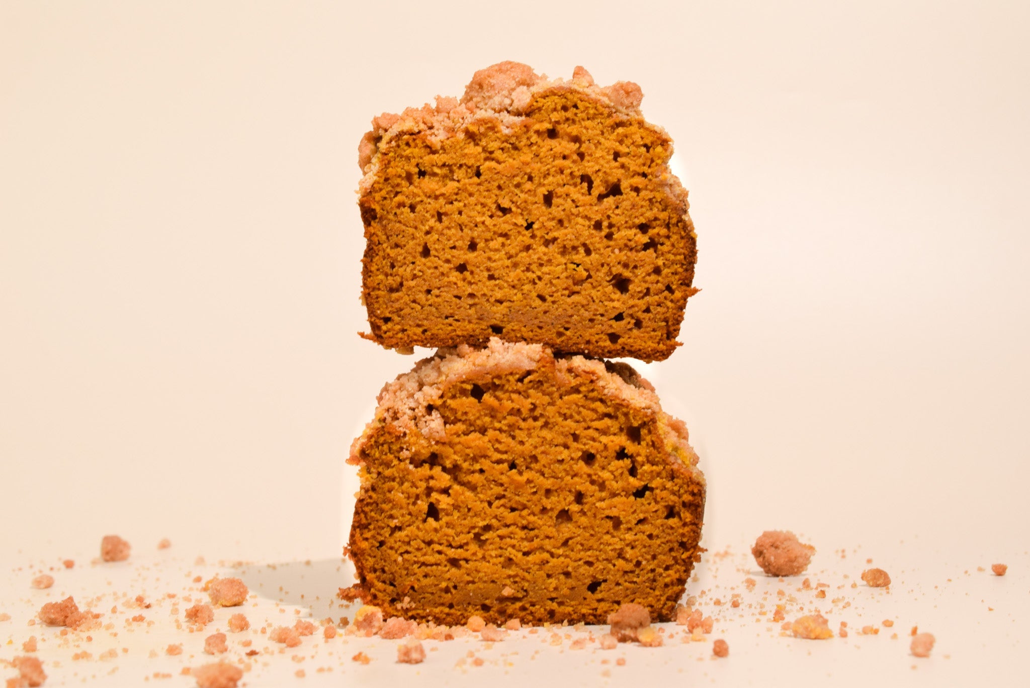 Two pumpkin breads stacked on top of each other