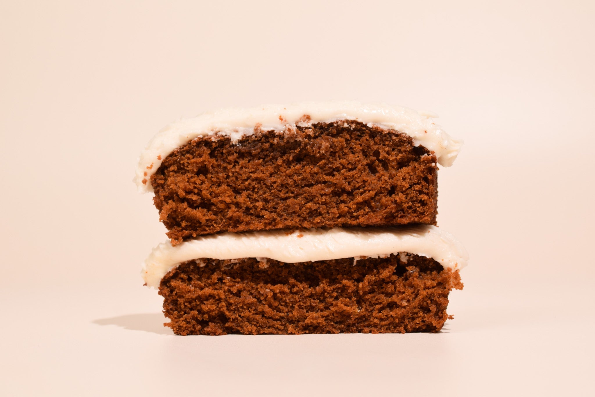 An image of two gingerbread cakes stacked on top of each other