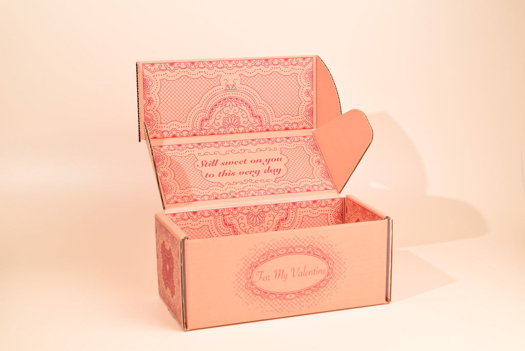 An image of the valentines day cookie box on a cream background.
