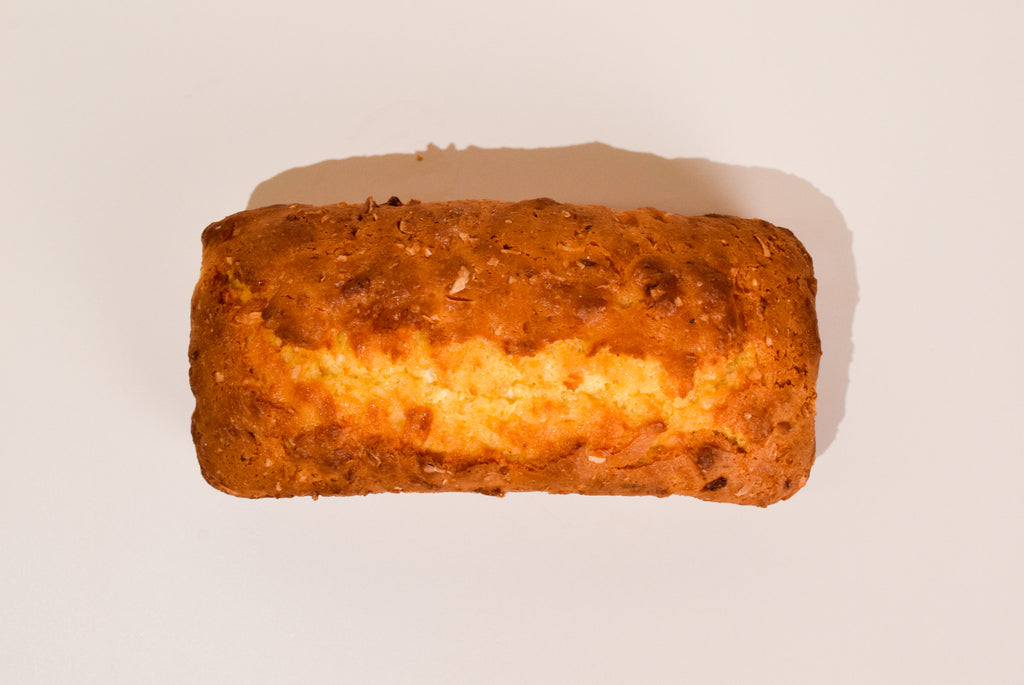 Loaf of Hawaiian Coconut bread on a white background