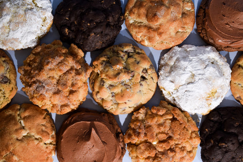 Overhead view of a Keksi build your own cookie box packed with assorted cookies