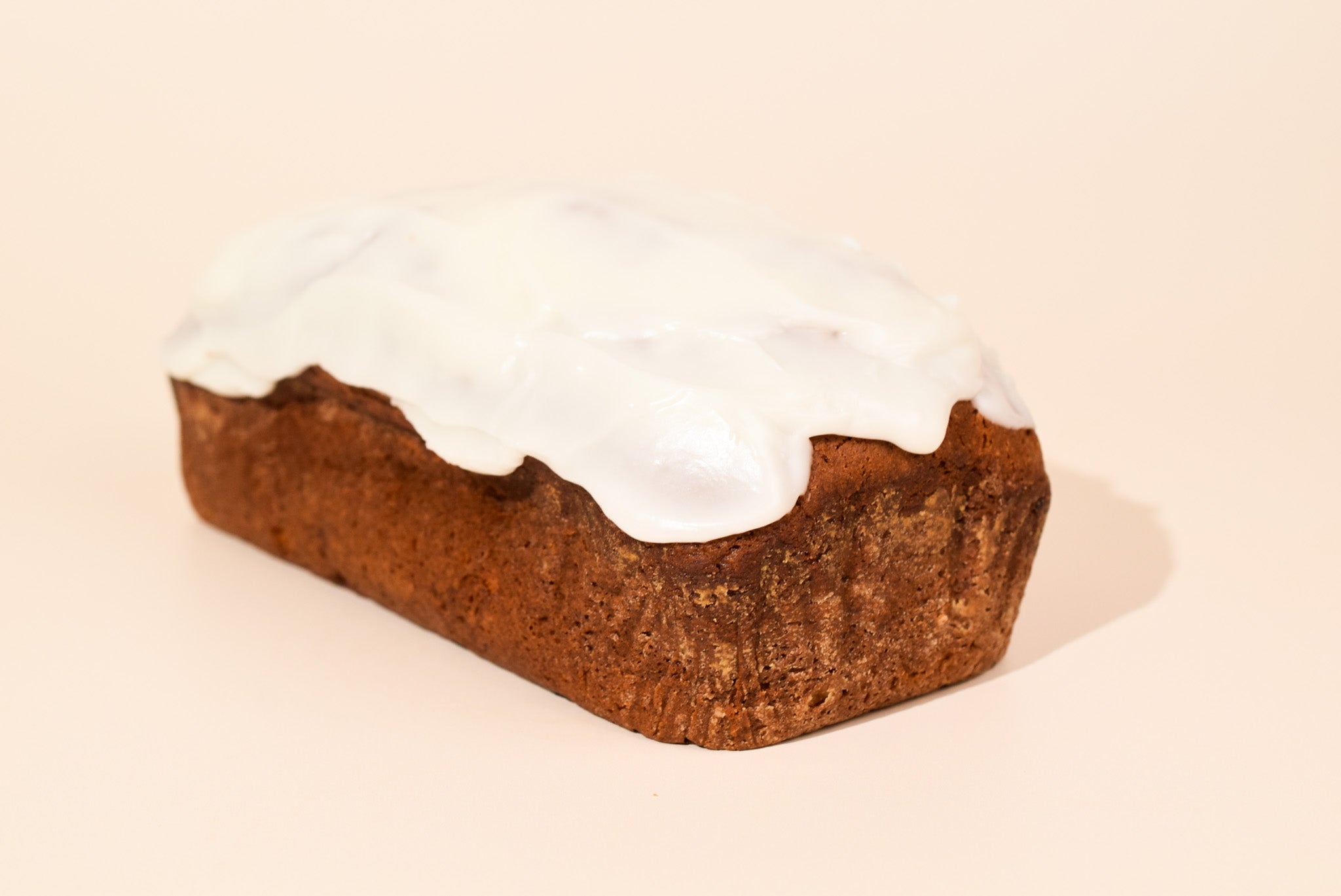 Keksi Iced Lemon Bread on a cream background.
