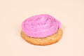 A Blackberry Honey Cookie on a cream background.
