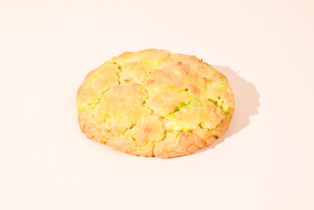 A Key Lime Pie cookie on a cream background.