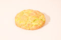 A Key Lime Pie cookie on a cream background.