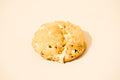 A Honey Pistachio cookie on a cream background.